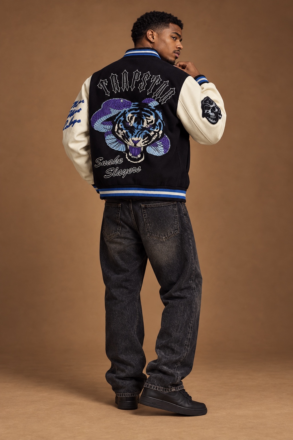 Model in a Trapstar tiger varsity jacket