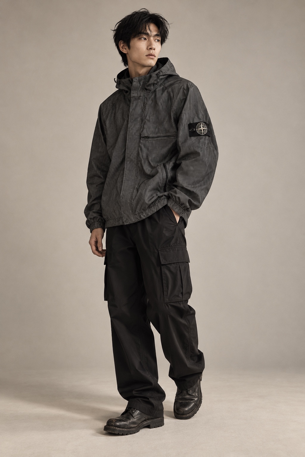 Model in a Stone Island reflective jacket